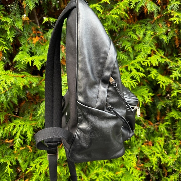 Saint Laurent
Men's Black Ysl City Star Embossed Backpack leather unisex - Picture 16 of 16